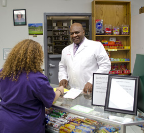 Pharmacist with customer
